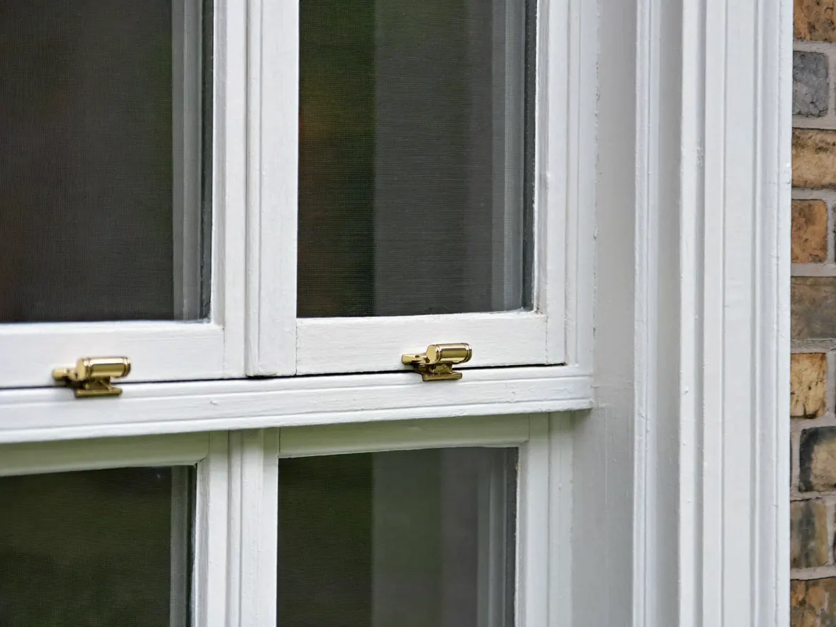 A freshly painted timber sash window on a period property