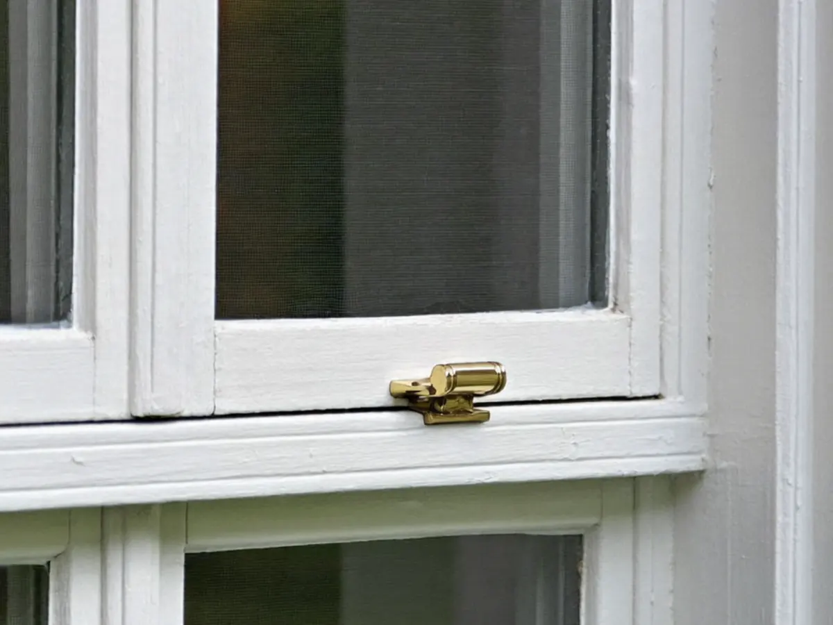 Close-up of a window frame being finished during a home installation